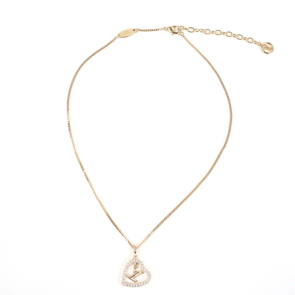 LOUIS VUITTON Gold Heart Necklace - Picture 3 of 9